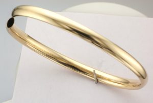 9CT HOLL OVAL FLEXI BANGL