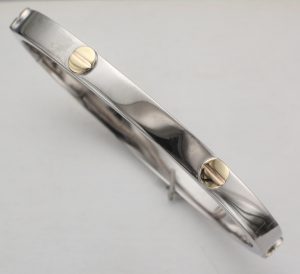 9CT MC SCRW TOP OVL BANGL