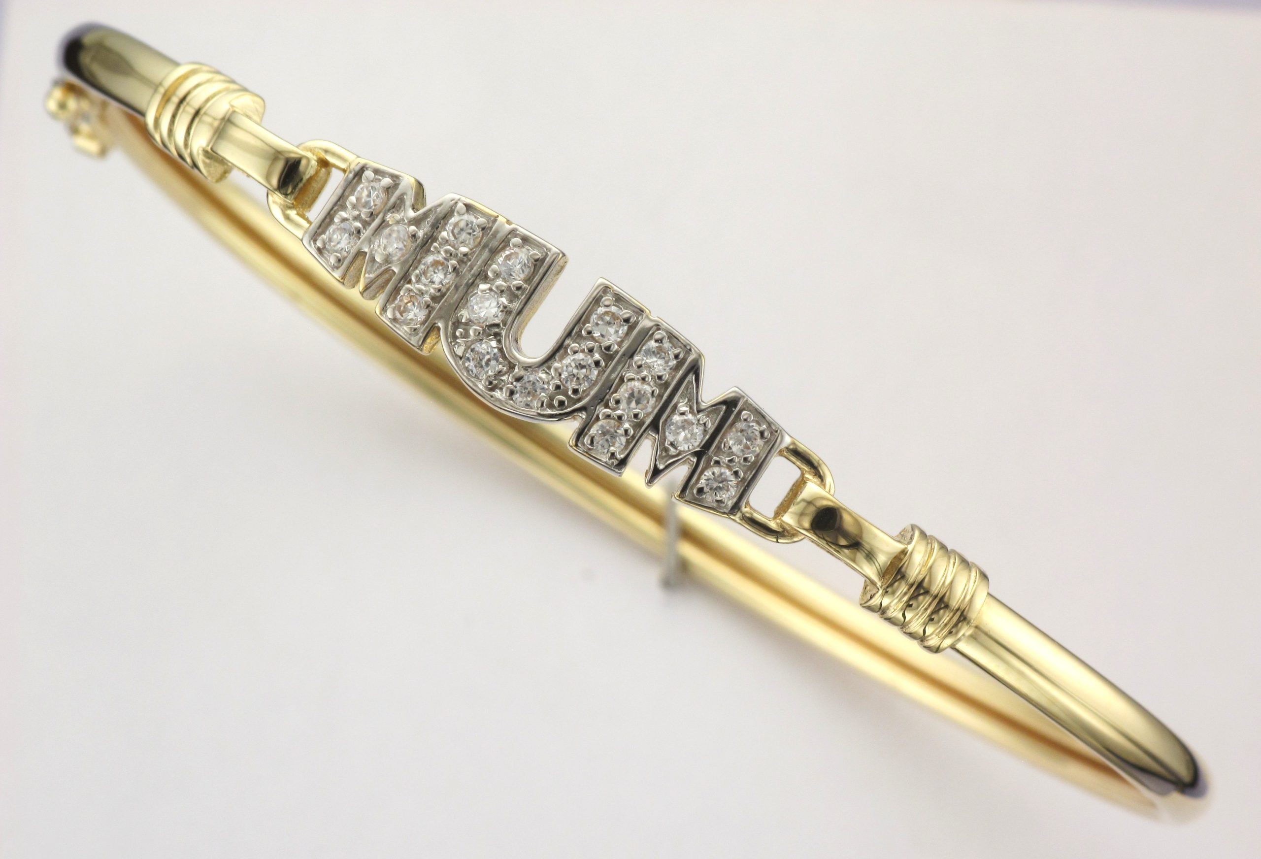 9CT GOLD HOLLOW CUBIC ZIRCONIA SET MUM WIRE BANGLE
