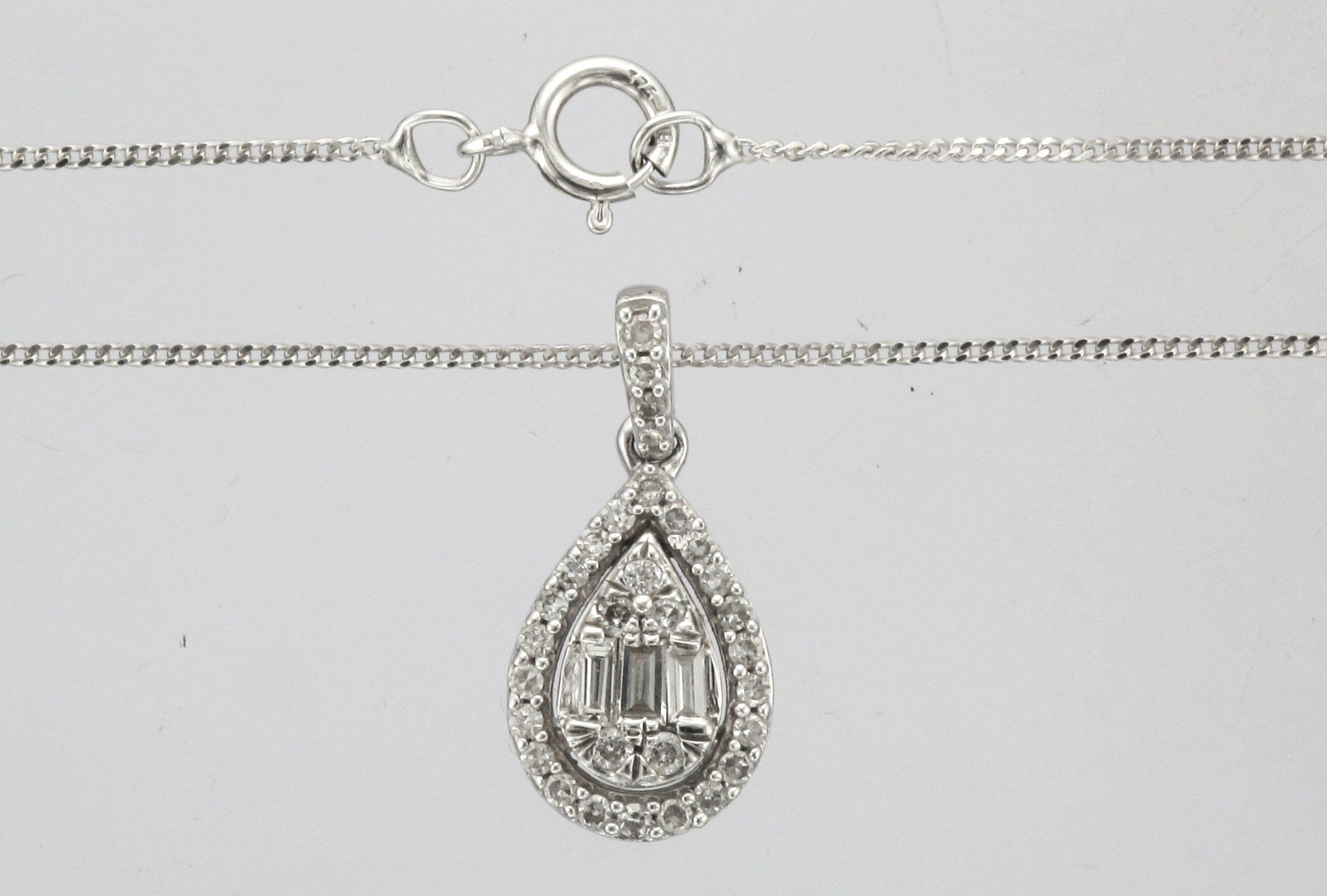 9CT WHITE GOLD DIAMOND SET TEAR DROP CLUSTER PENDANT ON A CHAIN
